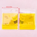 Self-adhesive cartoon bear cookie bags with yellow floral pattern for gift candy - 50 Pieces/Pack (10x10cm) / Yellow Cute Bear