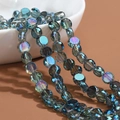 Faceted bohemian crystal glass beads in deep blue-green with iridescent AB finish - Transparent-AB Hole Blue