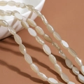 Faceted oval beige glass crystal beads for DIY handmade jewelry and beaded crafts - 60 Pieces/Pack / Solid Color - Light Tawny