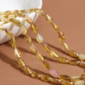Faceted amber crystal beads in olive shape for DIY necklace and bracelet jewelry making - 60 Pieces/Pack / Transparent - Yellow