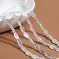 Faceted iridescent AB glass rice beads in translucent blue for DIY jewelry making - 60 Pieces/Pack / Transparent AB Clear