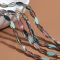 Faceted iridescent glass beads with aurora AB coating for DIY jewelry making - 60 Pieces/Pack / Transparent Purple Green AB Color
