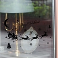 Black silhouette Christmas window stickers featuring Santa Claus sleigh and reindeer - 58x17CM / Black