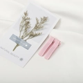 Set van twee lichtroze haarclips omwikkeld met ripslint voor doe-het-zelf haarstrikken - 5cm / Roze