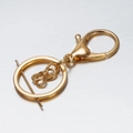 Porte-clés en métal doré avec fermoir mousqueton, nœud celtique et anneau plat robuste - Style de Chaîne / Or KC