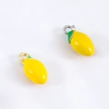 Pastel lemon-shaped alloy pendants with green leaves for DIY handmade jewelry crafts - Lemon