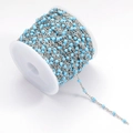Sky blue enamel bead chain DIY jewelry accessory on a white spool for necklaces - Blue & Silver