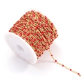 Gold-plated stainless steel bead chain with red enamel dots on a white spool - Gold Red