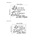 Adesivo murale Dance in the Rain con citazioni motivazionali in PVC nero opaco - TA273-Scritte-40-60