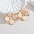 Vintage floral stud earrings with marble petals and a gold-plated stainless steel finish - Pink Texture
