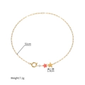 Detailansicht der 18k vergoldeten Edelstahlkette mit Seesternmuschel und Perlenanhängern - Stern und Rosa Seestern Stil (SFLN2272A)