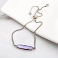 Detailed view of adjustable silver box chain with oval purple zircon crystal stone - Purple
