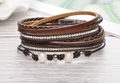 Bohemian multi-layer wrap bracelet featuring dark brown leather, pearls, and crystal chains - Coffee
