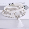 White multi-layer braided leather bracelet featuring opal stone, tassels, and magnetic buckle - White