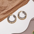 Retro style gold hoop earrings with dark marble resin texture on reflective mirror - Black