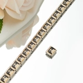 Detail of Italian charm bracelet link with gold spider web pattern and black enamel - Gold Spider Web Style (HA-17)