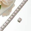 Close-up of Italian charm bracelet links with pink crown enamel and stainless steel - Crown Palace Style (HA-25)