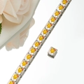 Detailed close-up of modular stainless steel link bracelet with yellow enamel star charms - Yellow Star Style (HA-28)