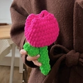 Handmade crochet tulip flower in bright pink purple yarn with green stem for decoration - Rose Red
