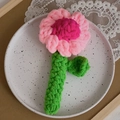 Handmade crochet pink chamomile flower pendant with green stem and leaf decor - Rose Pink