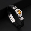Bracciale da uomo in pelle nera intrecciata con pietra occhio di tigre e chiusura - Nero e Colore Acciaio
