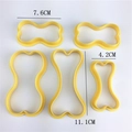 Juego de 5 cortadores de galletas amarillos en forma de hueso para repostería DIY - Estilo Forma de Hueso (2110)