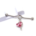 Close-up of industrial barbell featuring a pink crystal heart and sparkling white gems - Silver Pink
