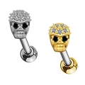 Dettaglio macro di piercing a teschio con zirconi bianchi in finitura argento e oro - Forma di Teschio (#17 Platino)