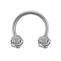 Macro shot of horseshoe nose ring with silver rose ends and clear zircon stones - Silver High Polish Double Head Rose Style