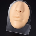 Detailed silicone facial model with nose and lips on an acrylic stand for medical training - Skin Tone Nose and Lip Practice Model (Includes L-Shaped Stand)
