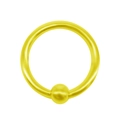 Macro detail of a 1.2*10mm matte yellow stainless steel horseshoe ring for body piercing - Yellow