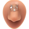 Detail of silver stainless steel bridge piercing chain featuring a floral sun pendant - Silver Sun Flower Rhinestone Style (#3)