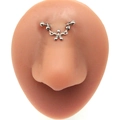 Detail of silver bridge piercing with chain and star pendant on silicone nose model - Silver Double Ball Pentagram Pendant Style (#4)