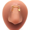 Gold stainless steel bridge piercing with double star pendants and cone ends on model - Gold Curved Double Star Style (#11)