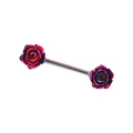 Detail shot of a stainless steel nipple barbell with colorful gradient rose floral ends - Gradient Rose Flower Style