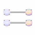 Detailed close-up of opal nipple rings with polished stainless steel bar and four-claw setting - White