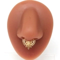 Golden cannabis leaf faux septum nose ring with beaded edges on a silicone nose model - Gold Leaf Style (#2)