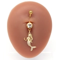 Golden mermaid belly button ring with sparkling zircon inlays on a skin-tone model - Mermaid Style (#8)