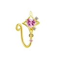 Macro detail of gold nose ring featuring a pink heart stone and starburst frame design - Pink Heart Starburst Style (NC312070007)