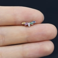 Detailed macro view of silver stud with five multi-colored round zircons in curved design - 5-Color Gemstone Arc Style (24080315050)