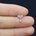 Macro detail of heart wing ear stud with pink zircon and star pendant accessory - Pink Heart Star Wing Style (24080316050)