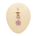 Close-up of a pink cherry blossom belly button ring with rhinestones on a skin model - Pink Pavé Cherry Blossom (BR25022701-7)