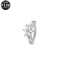 Makroaufnahme von ASTM F136 Titan Bauchnabelpiercing mit Blumen-Zirkonia-Verzierung - Sechsblättrige Blütenform / Silber Blume