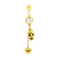 Dettaglio di un piercing all'ombelico dorato con teschio, cuore pendente e pietre zirconi - Stile Teschio Cuore Oro (BR25071113-G)
