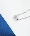 Macro shot of polished heart pendant with engraved letter A on stainless steel chain - Silver Letter A Style (JC1037S-A)