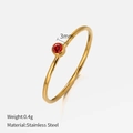 Slim titanium steel ring in gold finish featuring a 3mm red gemstone solitaire - Size 6 (52mm) / Gold-January Red