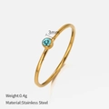 Minimalist gold stainless steel ring with a small 3mm round light blue gemstone - Size 6 (52mm) / Gold - December Lake Blue
