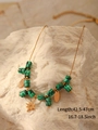 Detail of stone beaded necklace with star and leaf pendants and length guide details - Dark Green Octagonal Star Necklace (LC40008)