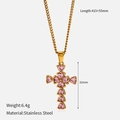 Macro shot of gold stainless steel necklace with pink heart gems in a cross pendant - Pink Heart Rhinestone Cross (YHTSN-2501051) / 415+55mm