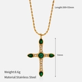 Macro detail of a gold stainless steel cross pendant with green pear-shaped gemstones - Green Pear Rhinestone Cross (YHTSN-2501135)